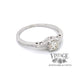 Edwardian inspired solitaire ring design is set with a sparkling .36 carat round H color, VS1 clarity, natural diamond in 14 karat white gold, agled front/side view