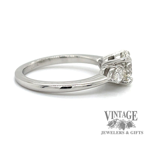 Platinum 1.28ctw round and pear-shape 3-diamond ring, side view