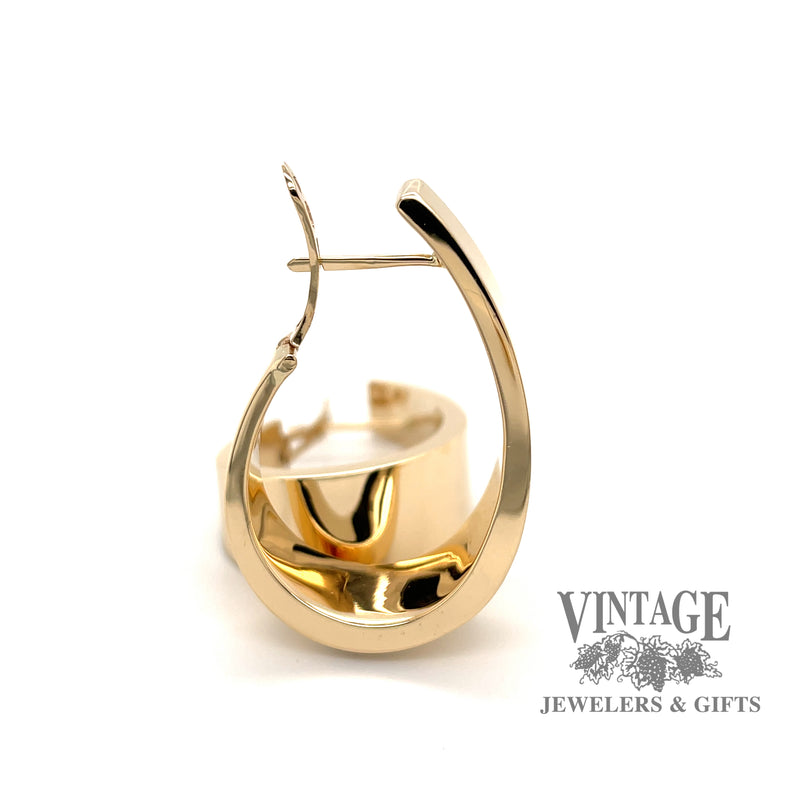 Large flat tapered 14ky gold hoop earrings, side view
