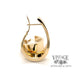 Large flat tapered 14ky gold hoop earrings, side view