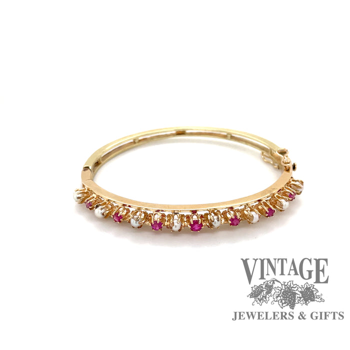 14 karat gold ruby and pearl bangle bracelet