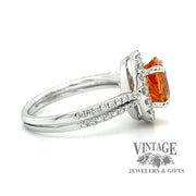 18 karat white gold 3.56 carat mandarin garnet and diamond ring, side view