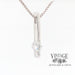 14 karat white gold bar set .25 CT diamond solitaire pendant, angled side/front view.
