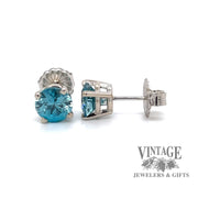 14 karat white gold 6 carat total weight round blue Zircon stud earrings