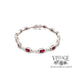 14 karat white gold ruby and diamond link bracelet, from top