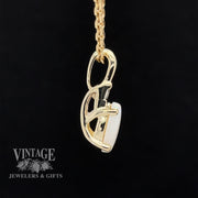 10 karat yellow gold white opal and diamond pendant, side view