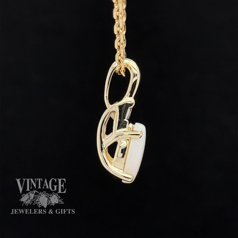 10 karat yellow gold white opal and diamond pendant, side view