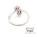 14 karat white gold .68ctw 2-ruby and diamond bypass ring, rear view