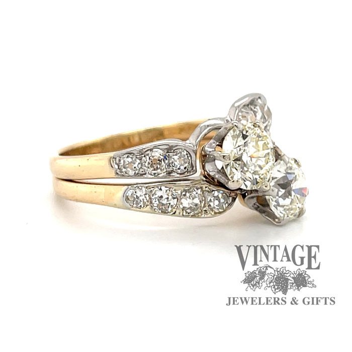 14 karat yellow and white gold 2.38 carat total weight diamond two stone vintage bypass ring, angled view