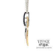 14 karat two tone diamond leaf shape necklace, side view