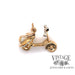 18 karat yellow and white gold 3-D Motor scooter charm 