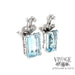 18k white gold Aquamarine emerald cut earrings, angled view