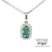 14 karat white gold .76ct Teal green tourmaline and diamond halo pendant