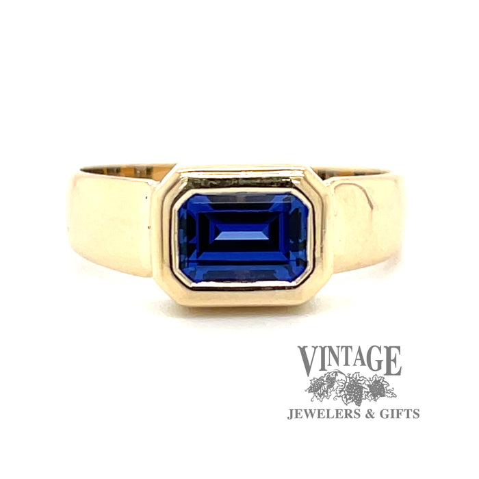 Emerald cut blue cubic zirconia in 14ky gold ring