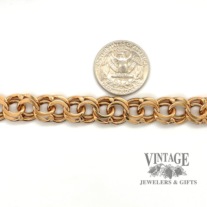 18 karat yellow gold 8-7/8" heavy bismarck link bracelet.