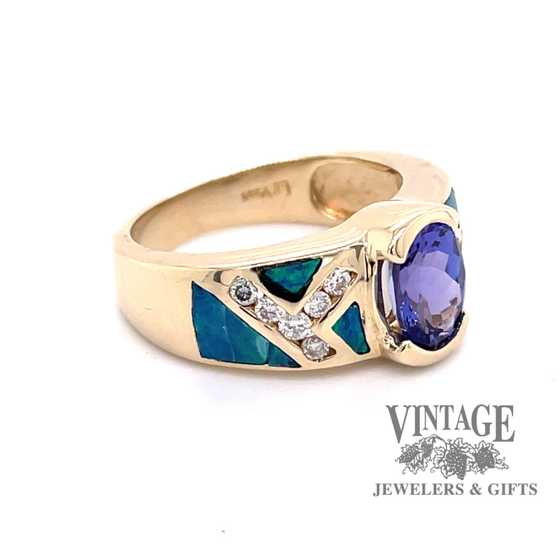 14 karat yellow gold tanzanite, inlay opal and diamond ring, angle side view