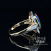 Black opal and diamond 14ky gold ring side