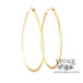 Large flat 14K gold teardrop shaped hoops from angle