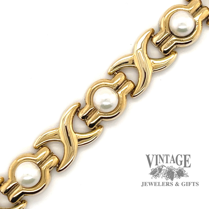 Pearl 14ky gold station link bracelet.
