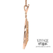 Pear shaped 14kr gold diamond pendant side