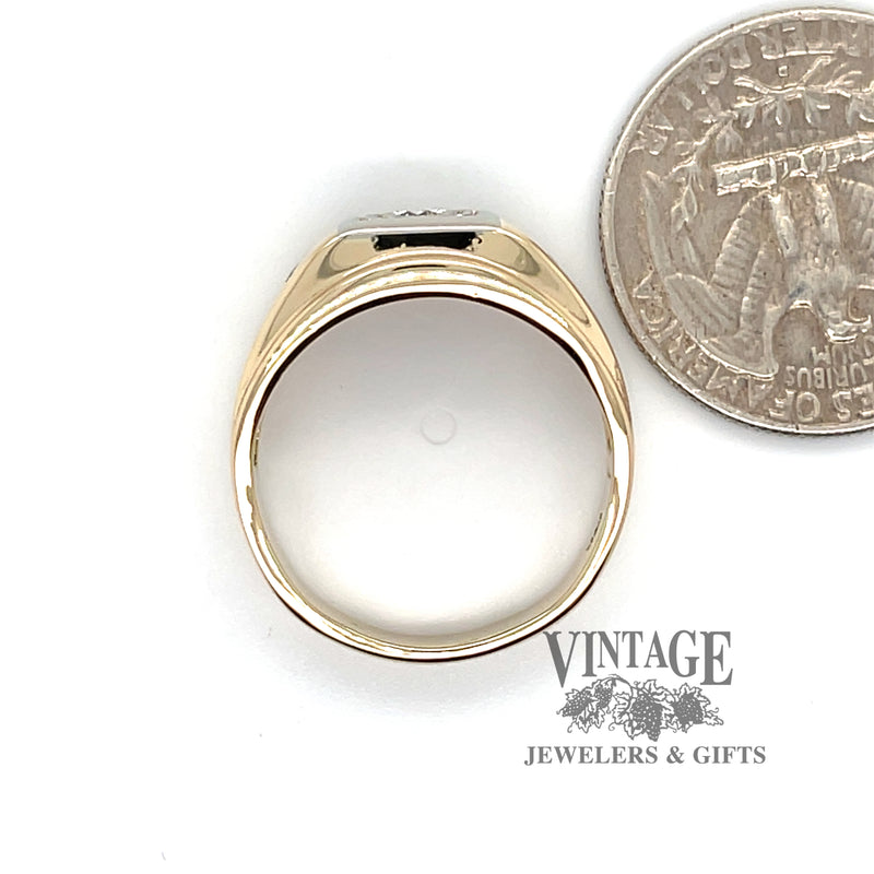 14 karat yellow and white gold .22ctw 3-diamond tapered ring, shown with quarter for size reference