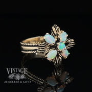 14 karat yellow gold opal flower motif cluster ring, angled view