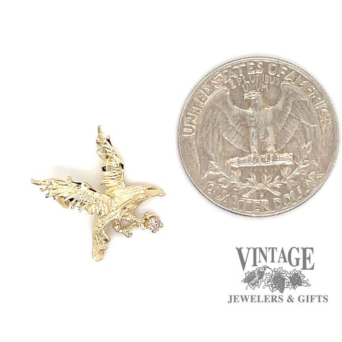 Eagle charm with small diamond in 14 ky