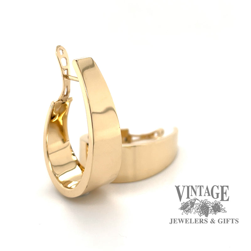Large flat tapered 14ky gold hoop earrings, angled