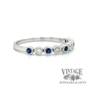 14 karat white gold diamond and sapphire “bubble” ring, angled view