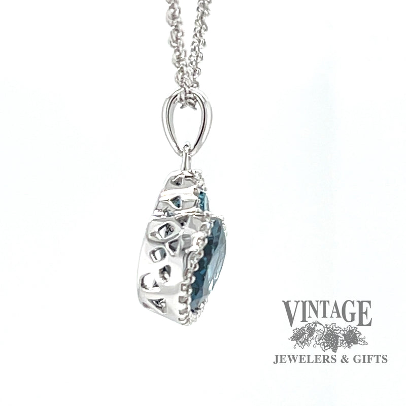 14 karat white gold 2.86 carat total weight Blue Topaz and diamond halo necklace, side view