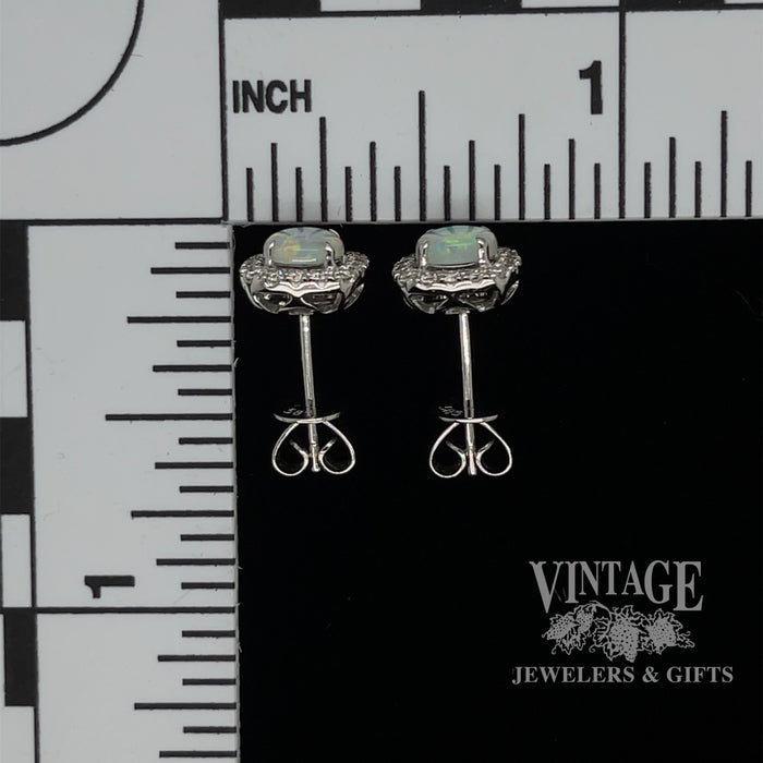 14 karat white gold .66ct Opal and diamond halo earrings, with measurements