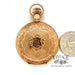 Antique Elgin 14ky gold hand engraved pocket watch, shown with quarter for size reference