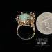 14 karat yellow gold 5ct opal and diamond rustic ring, shown with quarter for size reference
