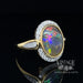 Black opal and diamond 14ky gold ring angle