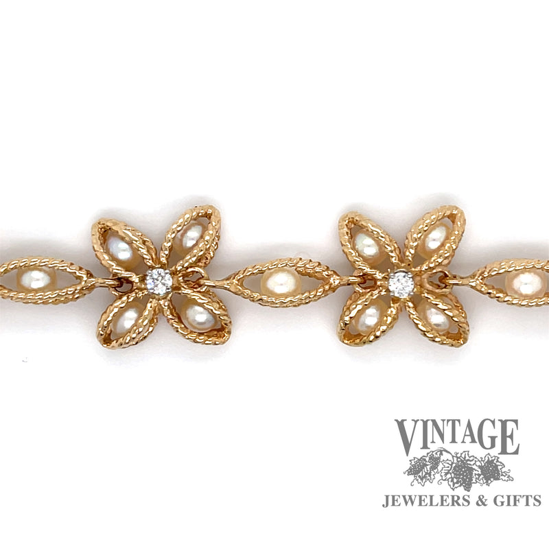 14 karat yellow gold pearl basket and diamond bracelet
