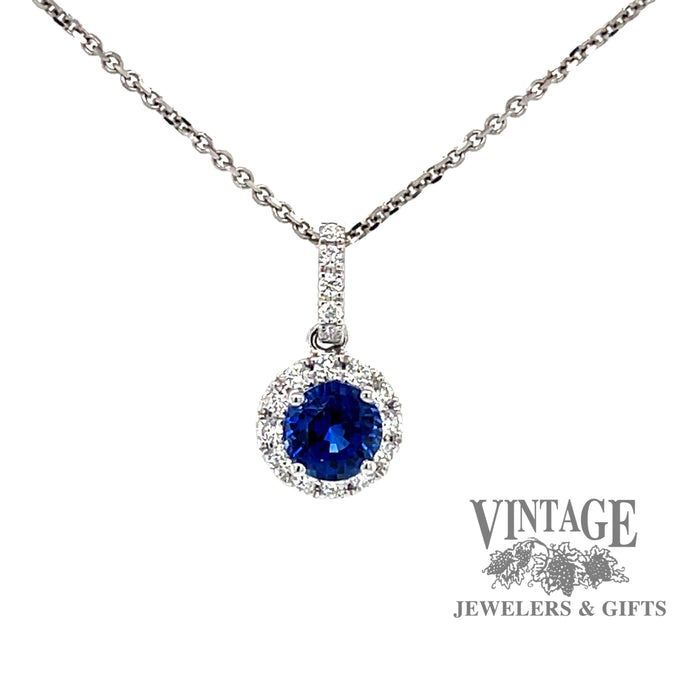 18k white gold Blue sapphire and diamond halo pendant, front view