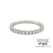 14 karat white gold French set .19ctw VS diamond band ring