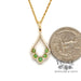 14 karat yellow gold .34ctw Tsavorite and diamond necklace, shown with quarter for size reference