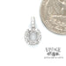 18 karat white gold .22ct diamond halo pendant mounting, shown with quarter for size reference