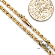 14 karat yellow gold 30” "AS IS" 3m solid rope chain, shown with quarter for size reference