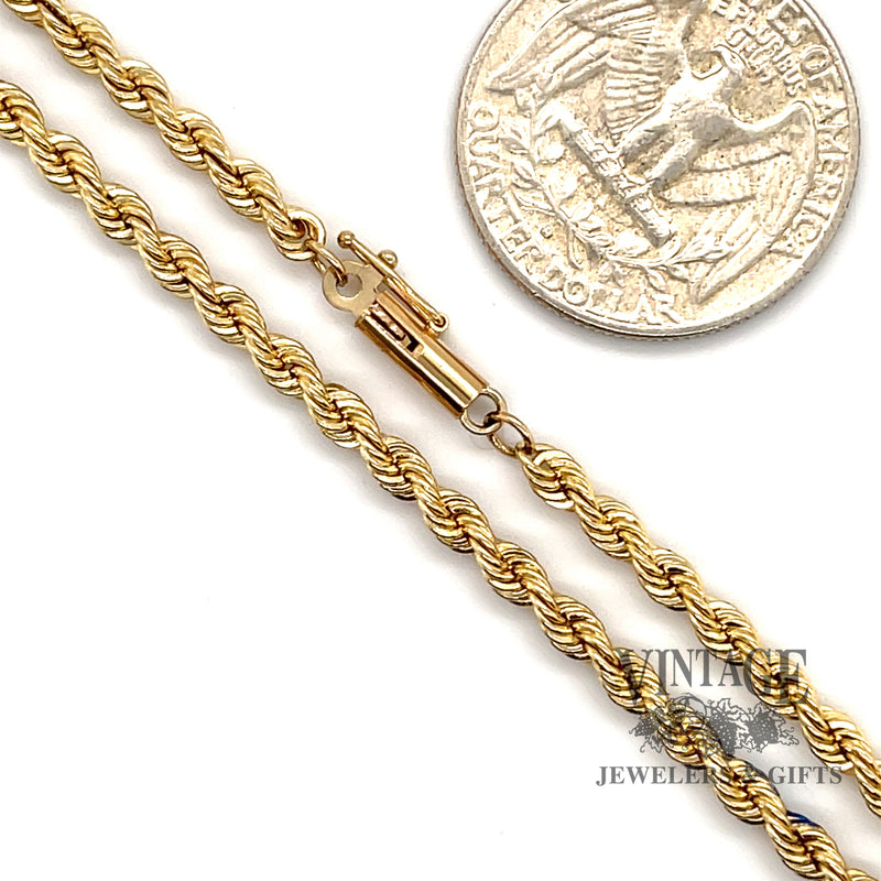 14 karat yellow gold 30” "AS IS" 3m solid rope chain, shown with quarter for size reference