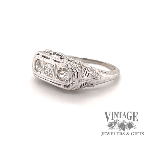 Vintage filigree .45 carat total weight 3 diamond 18k white gold band, angled view