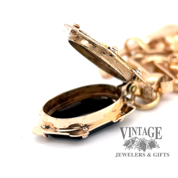 Vintage 14k gold pocket watch chain and mourning fob, showing open compartment of fob.