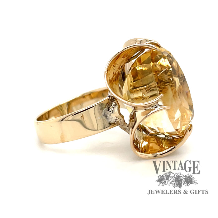 14 karat yellow gold oval golden citrine belcher style ring, side view