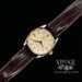Rolex Oyster Perpetual two tone, 14 karat yellow gold and stainless, automatic watch with strap, from top