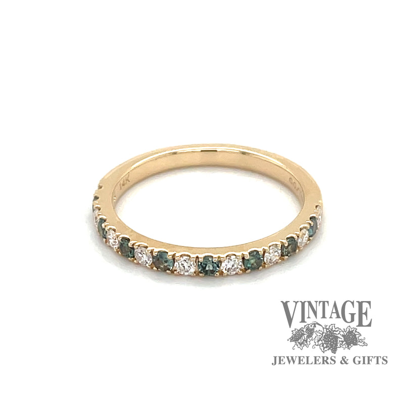 14 karat yellow gold band with alternating round brilliant diamonds and emeralds