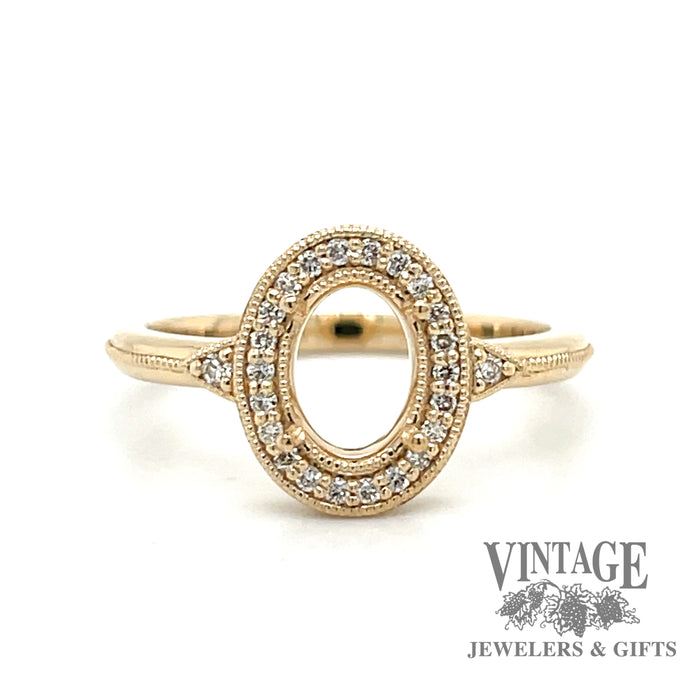 14 karat yellow gold oval semi-mount engagement ring
