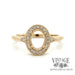 14 karat yellow gold oval semi-mount engagement ring