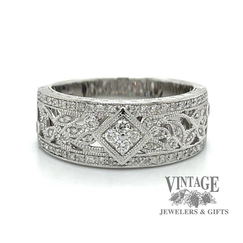 Diamond scroll 14kw gold ring