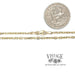 14 karat yellow gold 24” diamond cut 2.1 mm cable chain, shown with quarter for reference